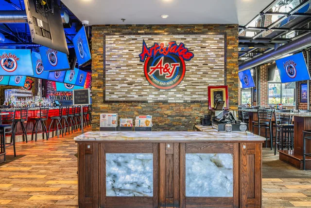 The Sterling Heights bar beneath the Art & Jake's wing artwork