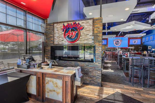 Inside Washington, the wing logo on the wall and daylight through the windows